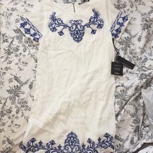 Boho white dress with blue floral lining print!